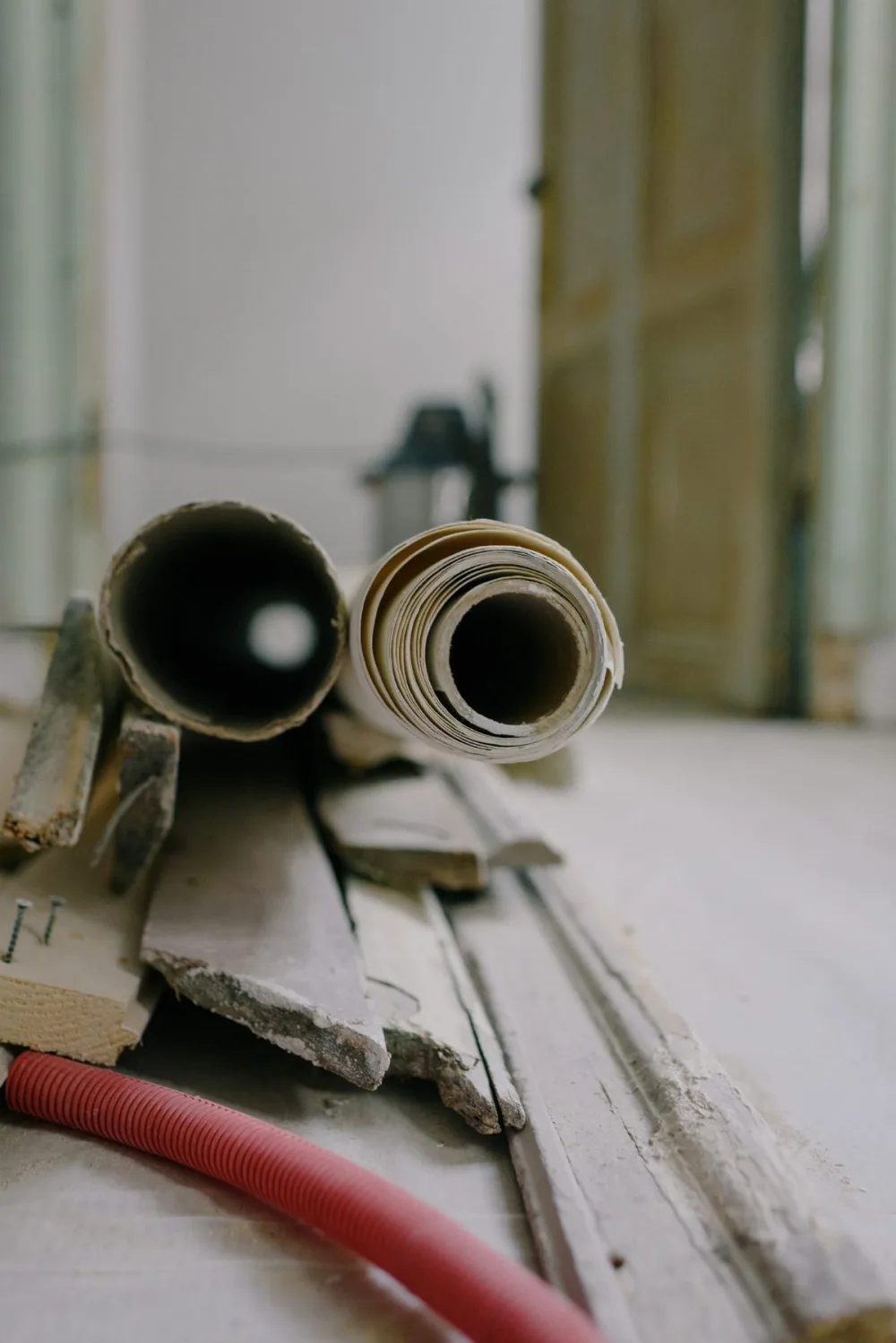 Construction material including pipes stacked at a project site